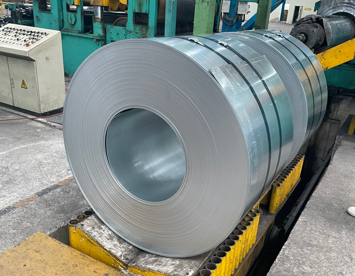 Galvanized steel coils are steel sheets dipped or electroplated in zinc to prevent rust and corrosion.